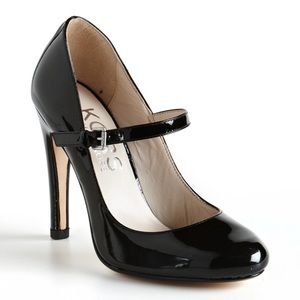 Michael Kors Black patent pump size 7 /4” heel.
